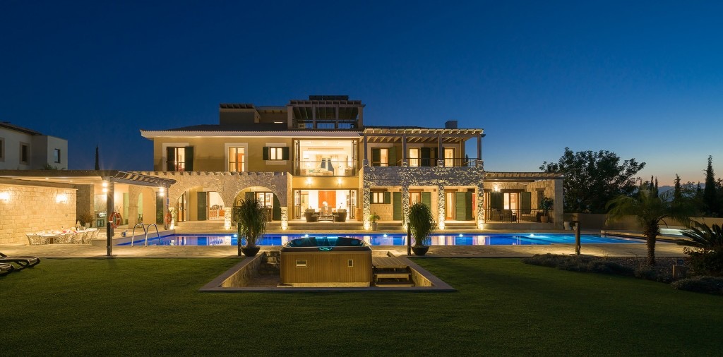 Luxury villa with pool in Cyprus at dusk